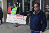 Ron Bates was on hand Tuesday to protest at Congressman David Valadao's office in Hanford.
